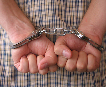 Man in Handcuffs in Manchester, NH